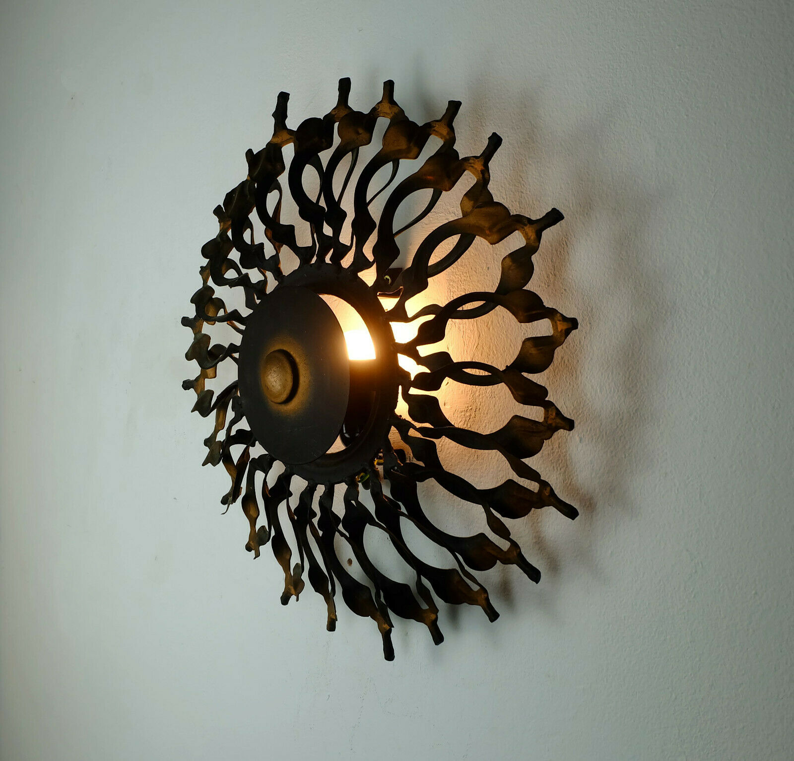 1960s SCONCE mid century sunburst brutalist black iron and copper colored