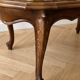 Oval coffee table in Louis XV style made of onyx and solid wood.