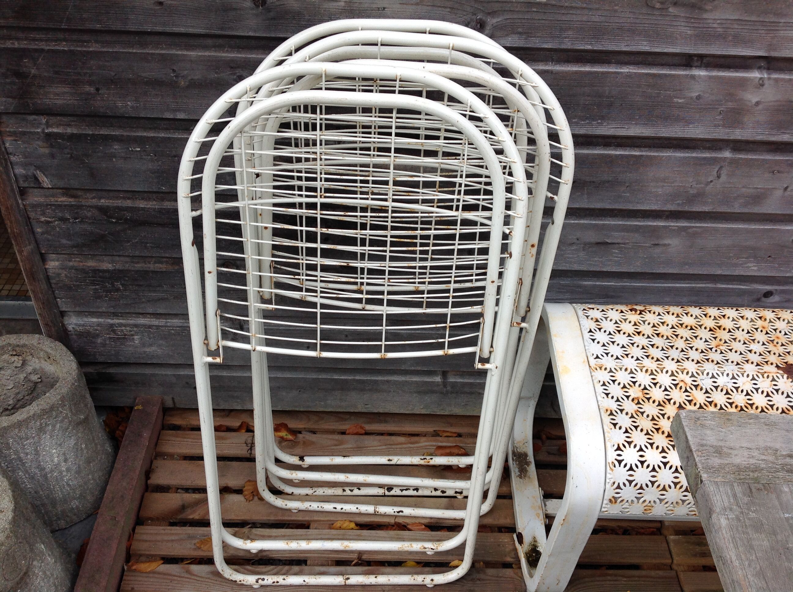 Trio of folding metal chairs