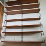 Modul Nisse teak string shelf with a vintage 60s design