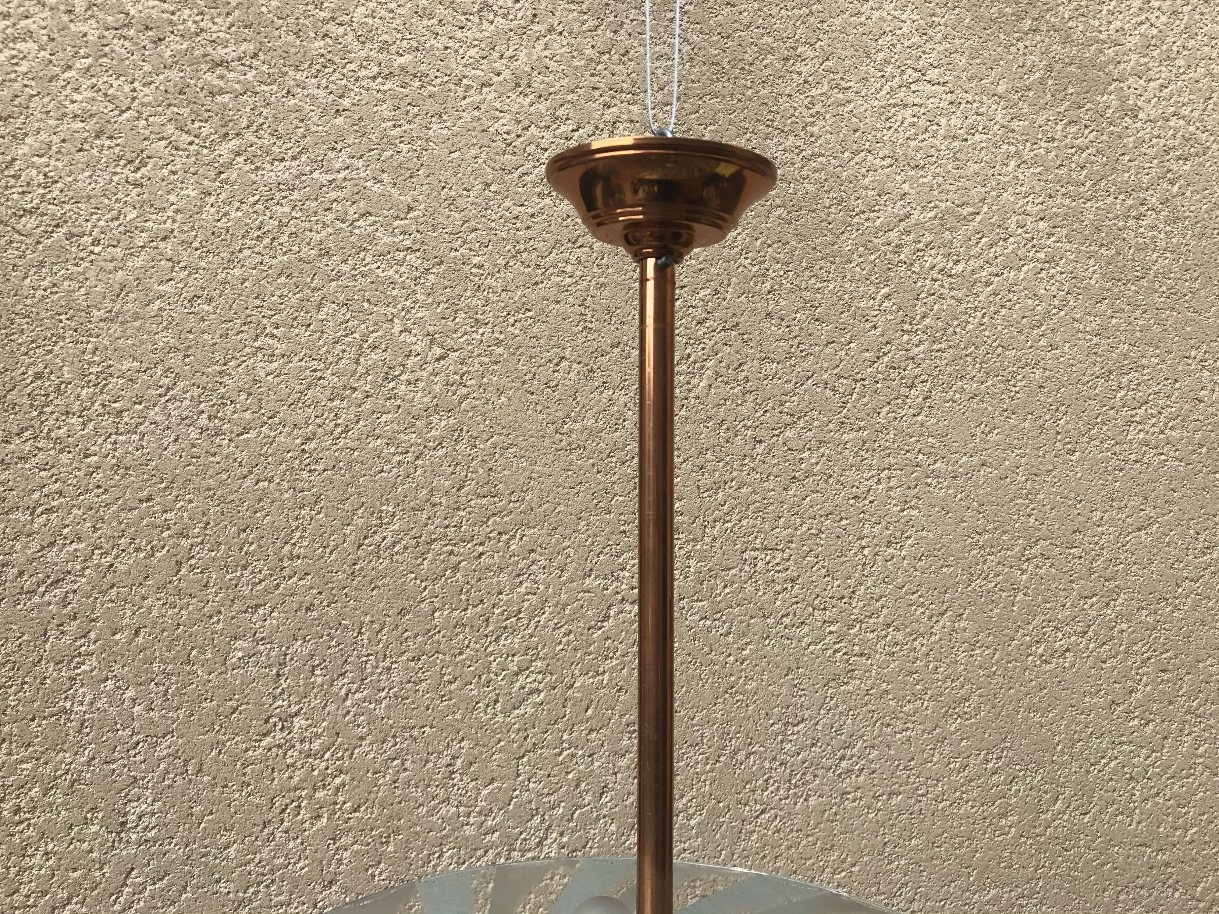 Copper and glass hanging lamp with his Ezan glass disc