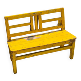Old yellow teak school bench
