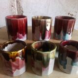 Six old yoghurt pots in enamelled porcelain