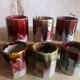 Six old yoghurt pots in enamelled porcelain