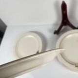 Set of 10 flat plates Longwy, 20th century, floral decoration.