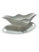 White porcelain sauce boat on tray