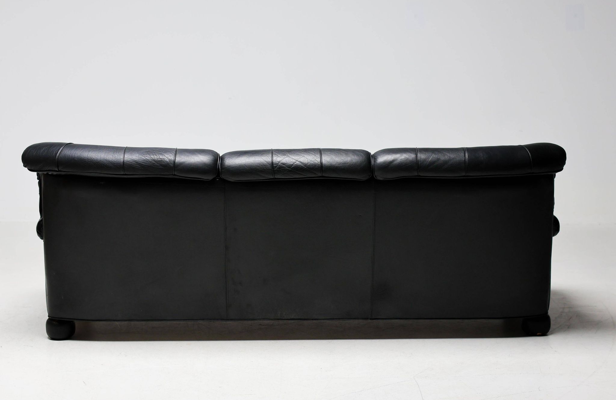 Three-seater sofa "Jupiter" in black leather by Arne Norell, Sweden, 1960.