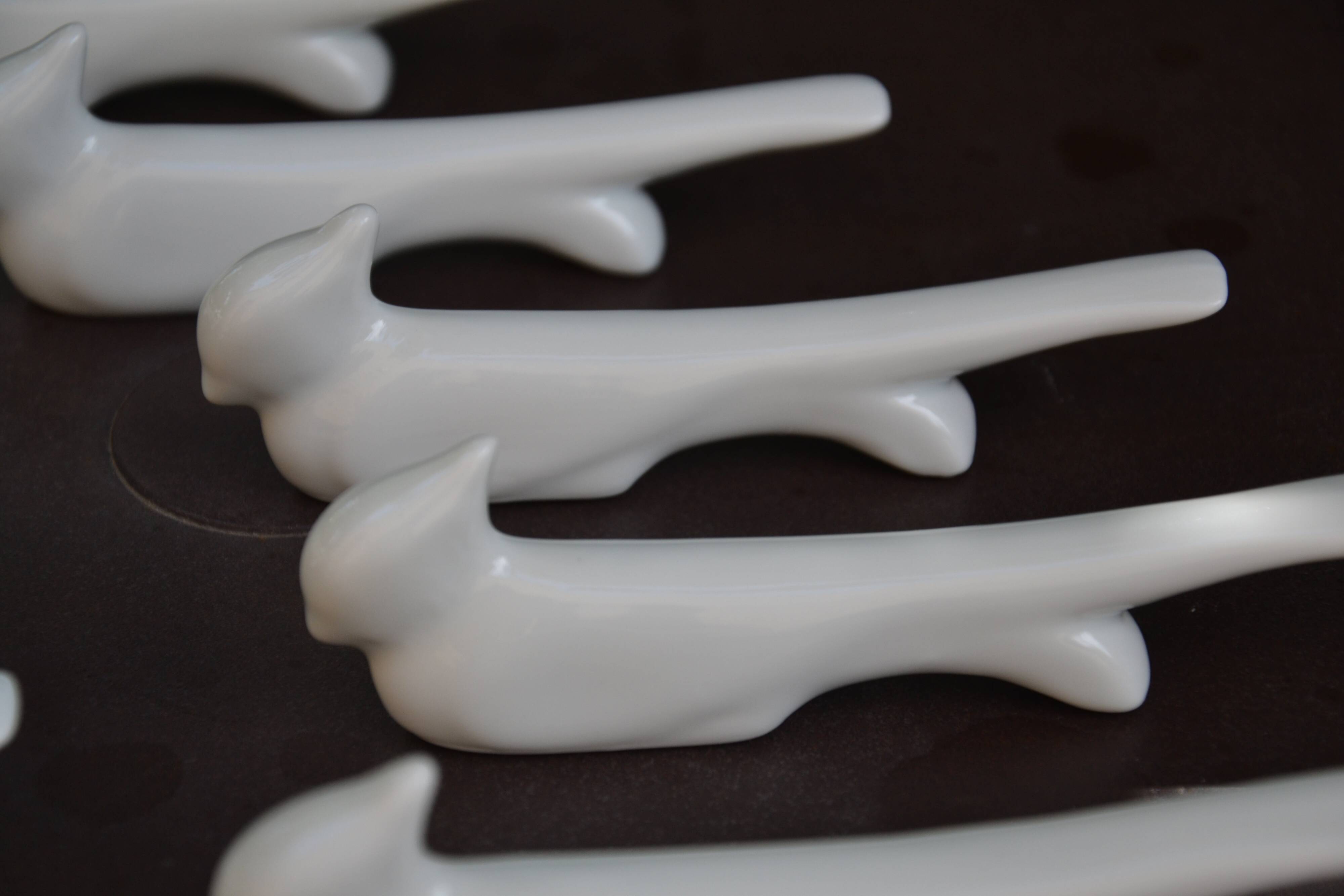 10 ceramic "bird" knife rests