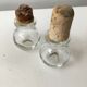 Lot of 2 old glass and tin condiment service bottles and corks