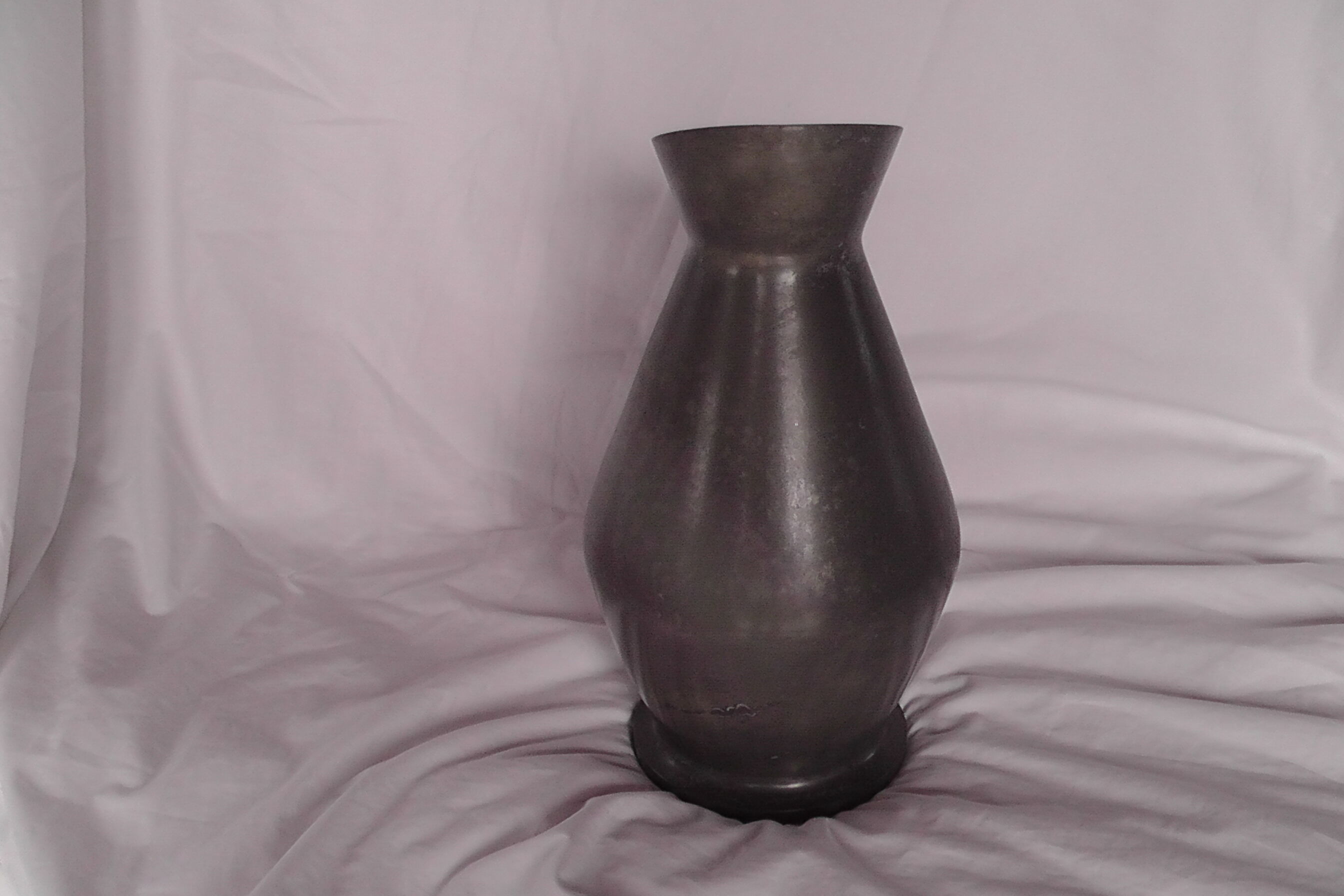 Tin pitcher vase of the manor