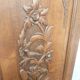 pair of antique solid oak cabinet doors with bird decor