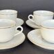 Set of 4 porcelain cups and sub-cups