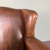 Vintage armchair in patinated sheep leather