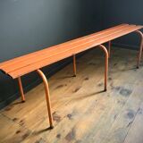 Old orange metal bench