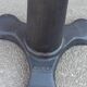 Height-adjustable leather stool with cast iron base