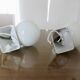 Pair of streamline opaline wall lights from the 80s