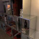 Modular bookcase, shelves composed of cubes facets of glass desselles