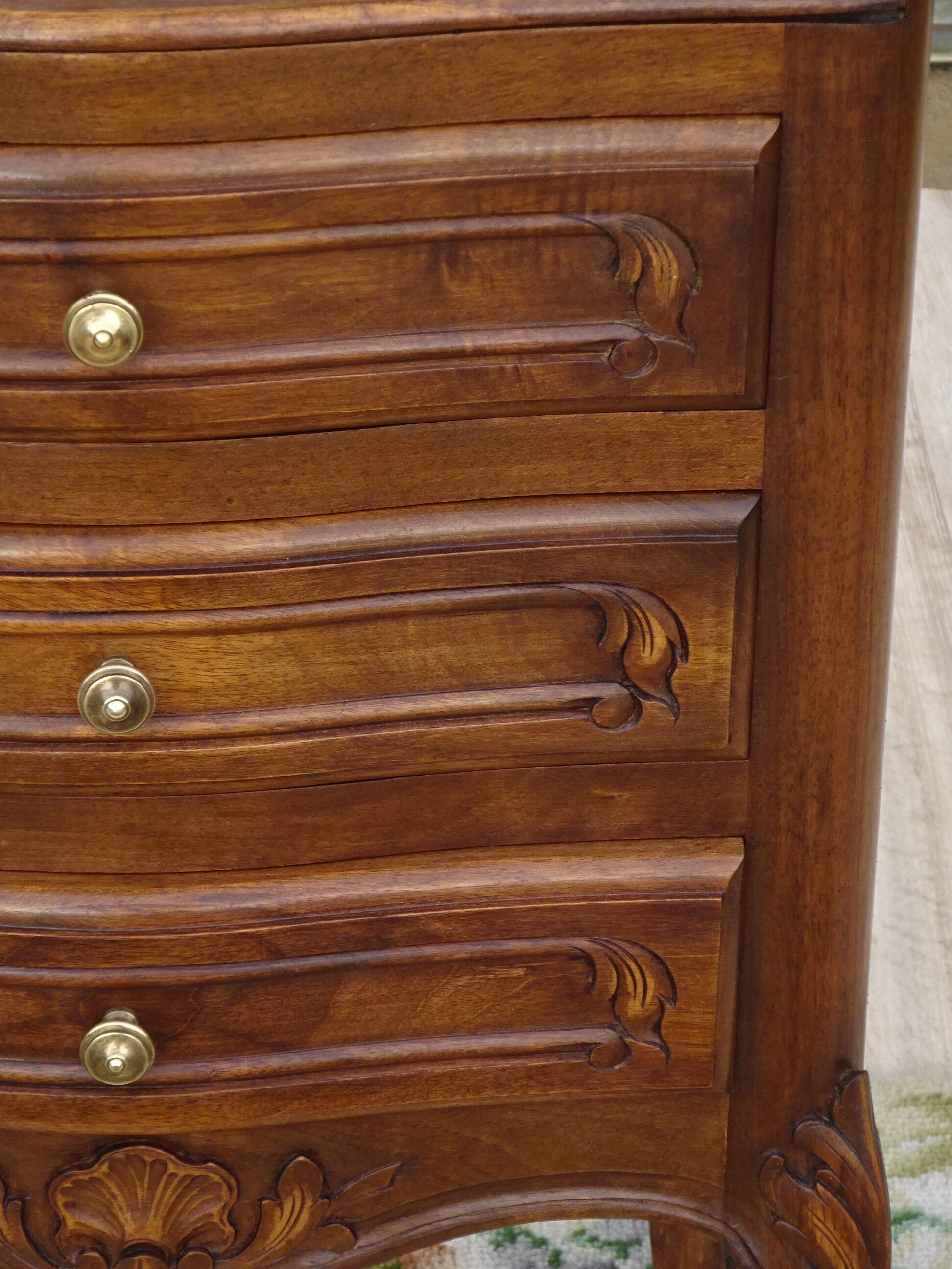 Louis XV bedside table in walnut, 3 drawers, raised edges on the tops.