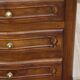 Louis XV bedside table in walnut, 3 drawers, raised edges on the tops.