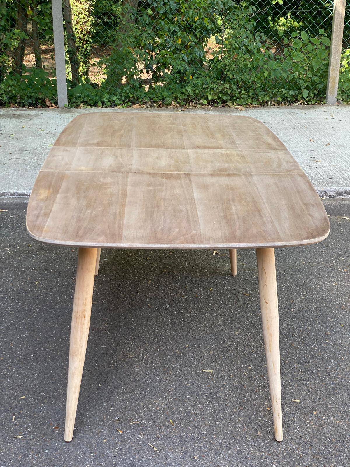 Renovated Scandinavian extendable dining table in teak and veneer from 1980.