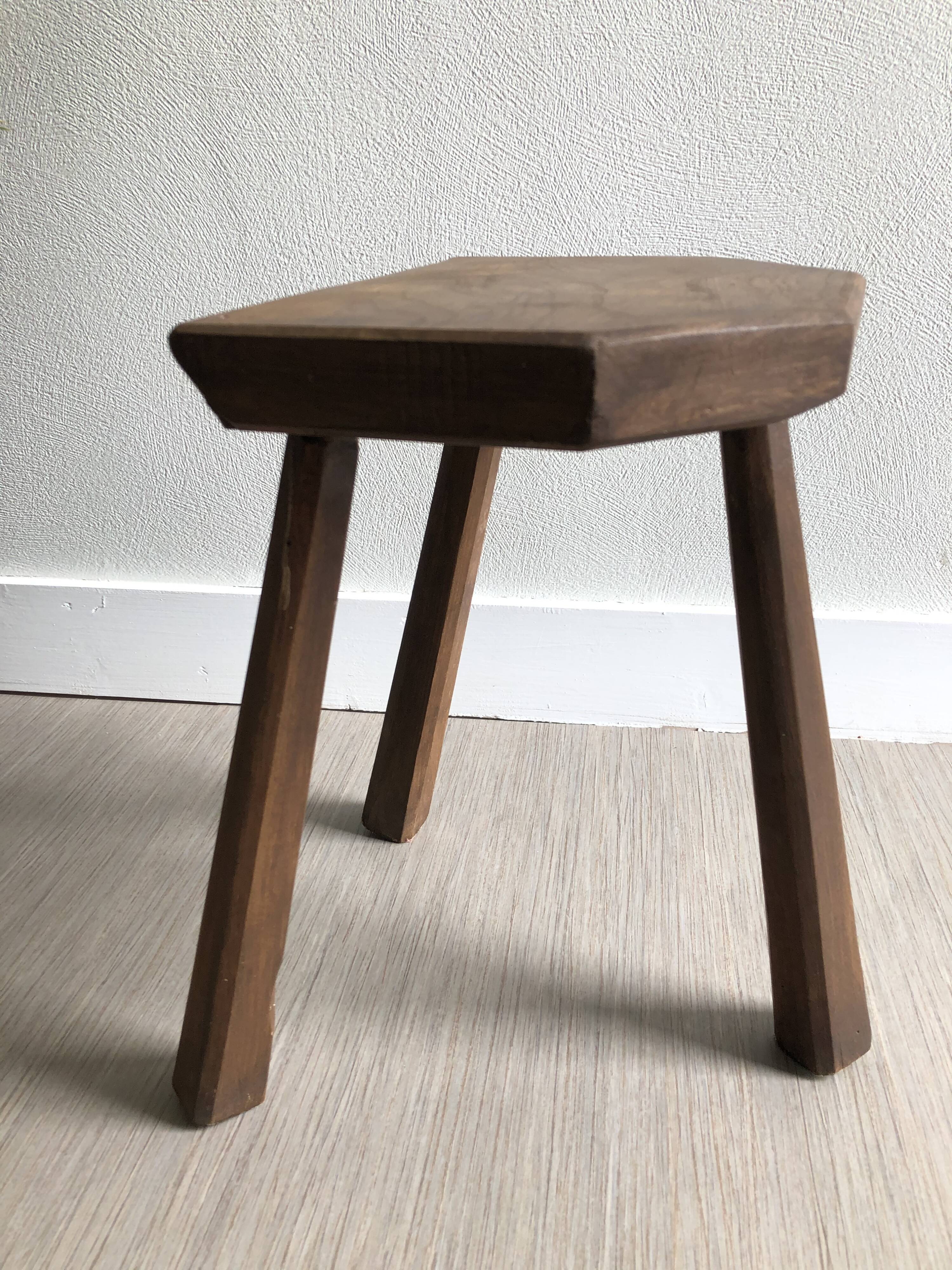 Wooden tripod stool