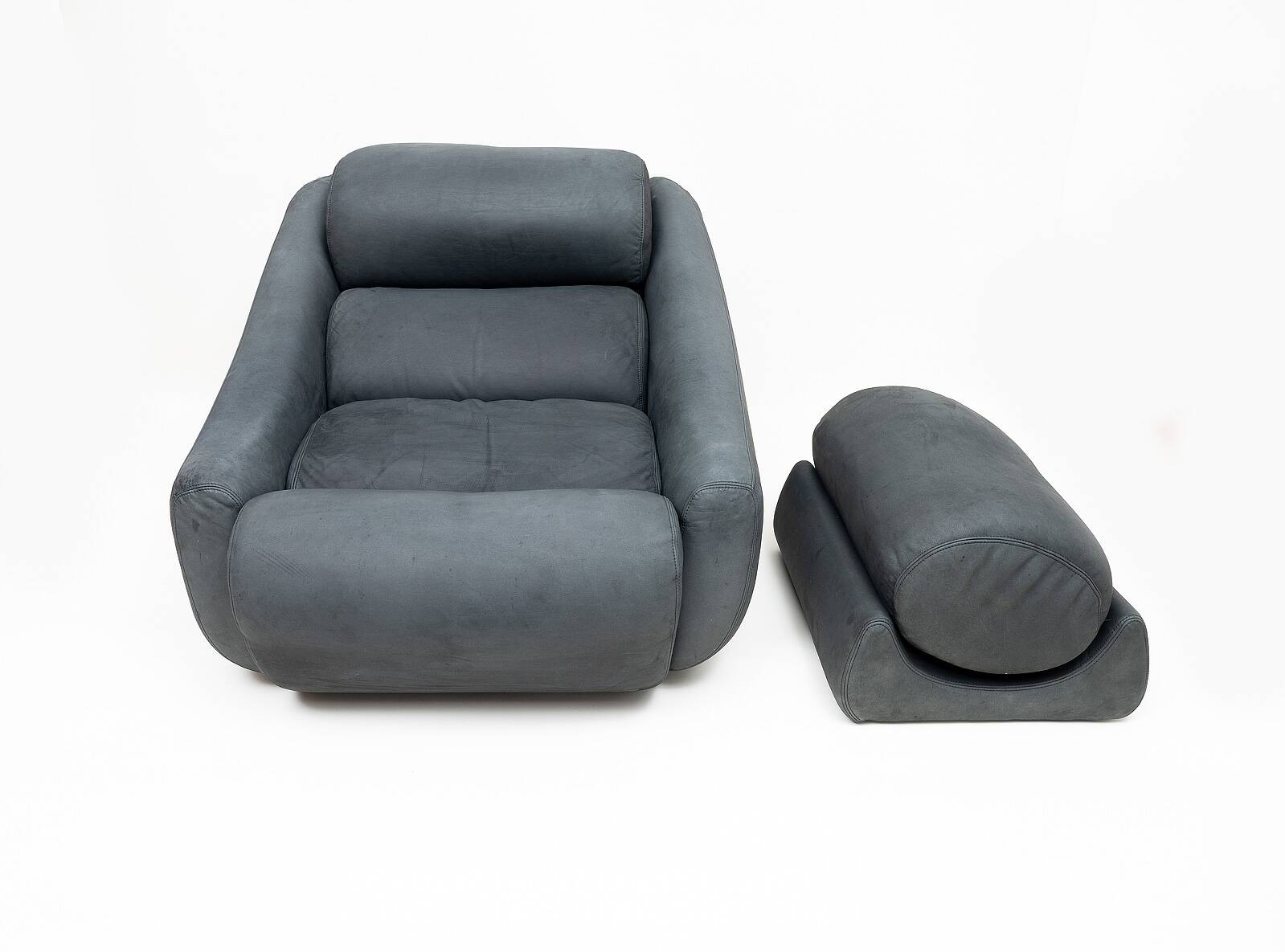 Large lounge chair and ottoman in leather, 1970