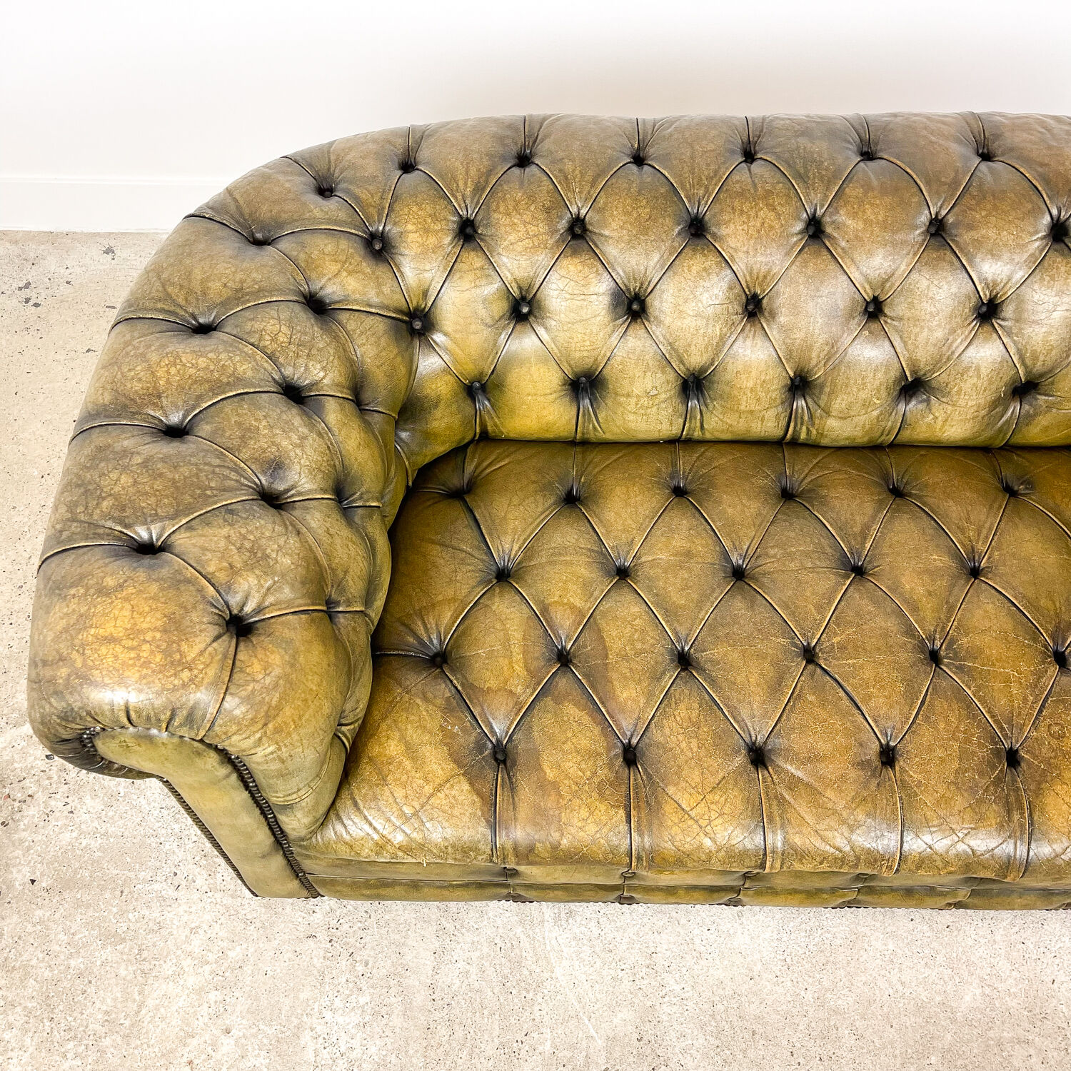 Old vintage leather chesterfield sofa