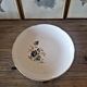 Hollow round plate Moulin des Loups Volubilis, blue flowers and gilding.