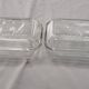 Two Arcoroc glass dairy cow butter dishes
