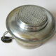 Individual silver metal coffee maker