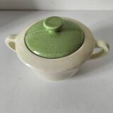 Two sugar bowls and a textured plate in turquoise and green Salins earthenware.