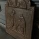EIGHTEENTH CENTURY CAST IRON FIREPLACE PLATE REPRESENTING A WOMAN AND A WOLF