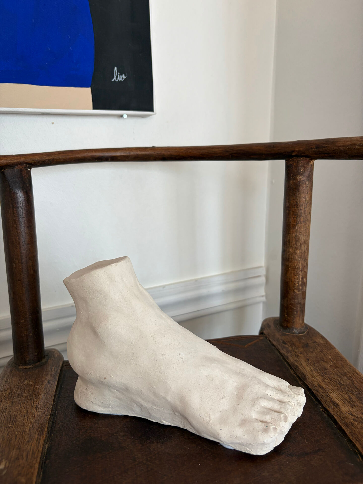 White plaster foot cast