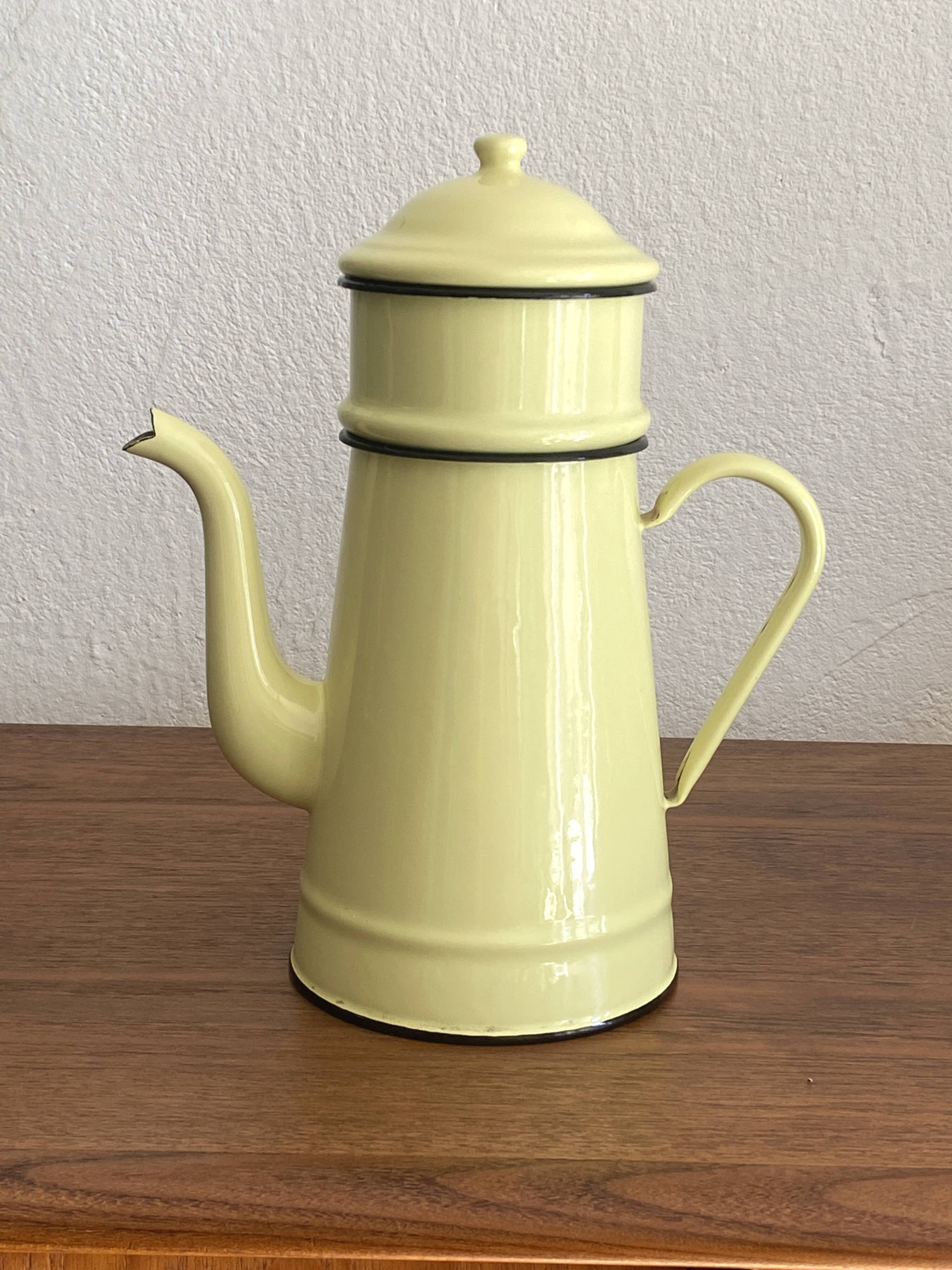 Large vintage coffee pot in pale yellow enamel.