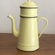 Large vintage coffee pot in pale yellow enamel.