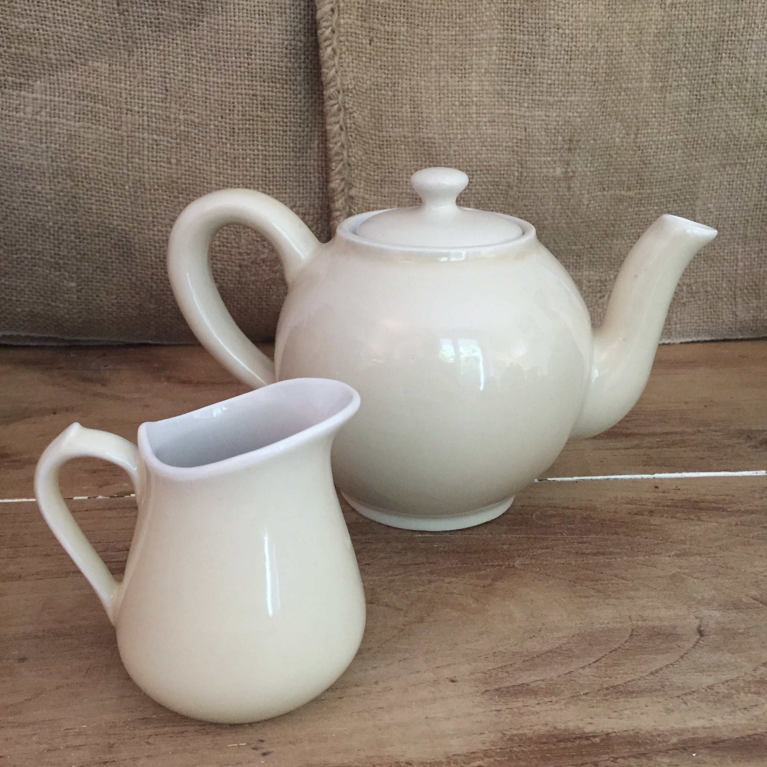 Teapot and vintage milk jar