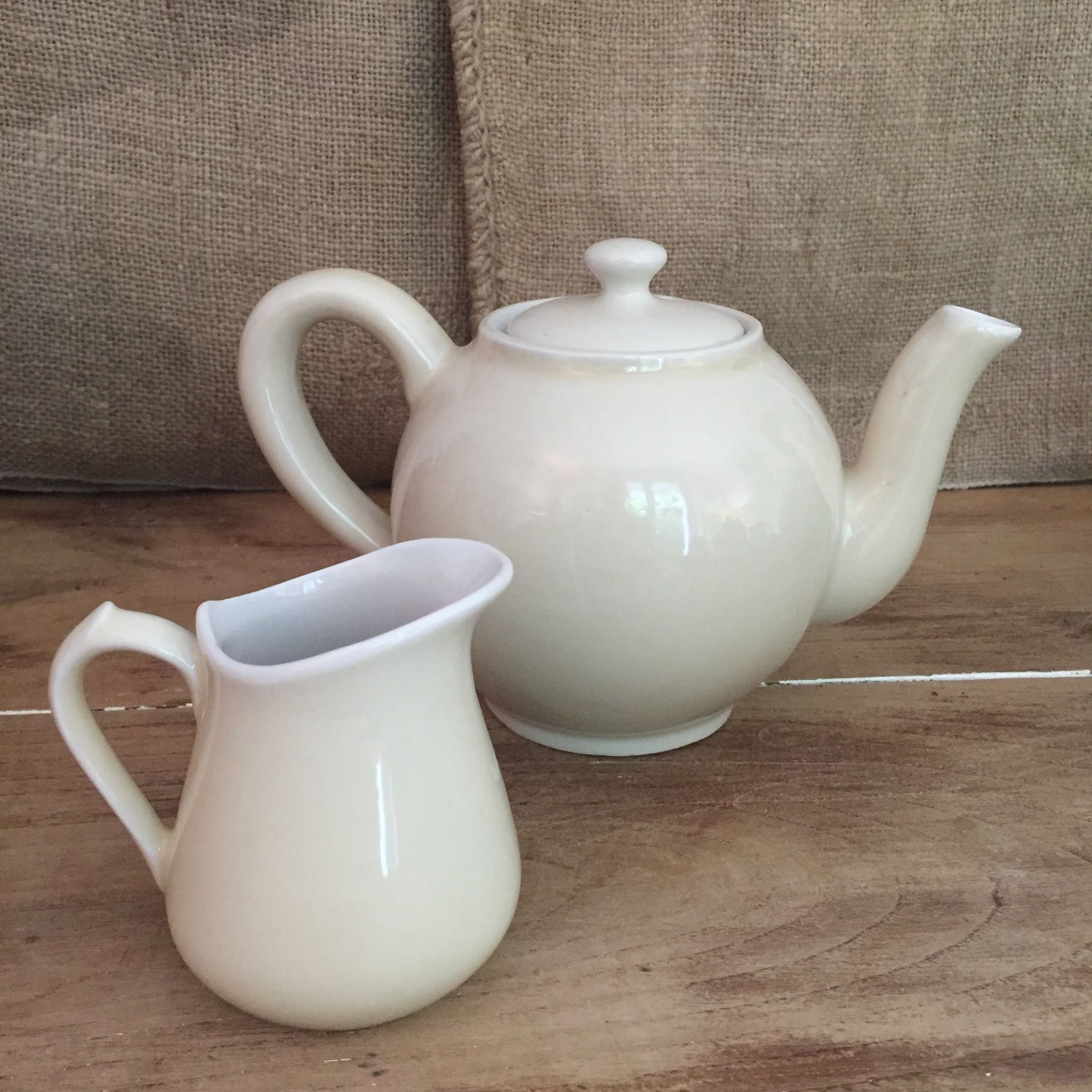 Teapot and vintage milk jar