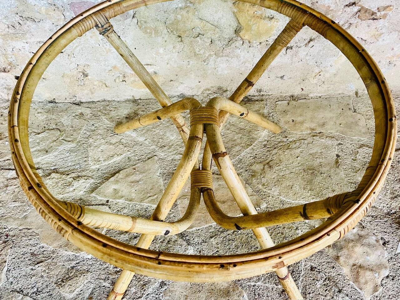Round bamboo and rattan coffee table with glass top, circa 1960s