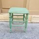Antique green stool