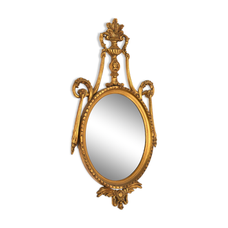 Miroir ovale en bois à patine doré 130 x 68 cm