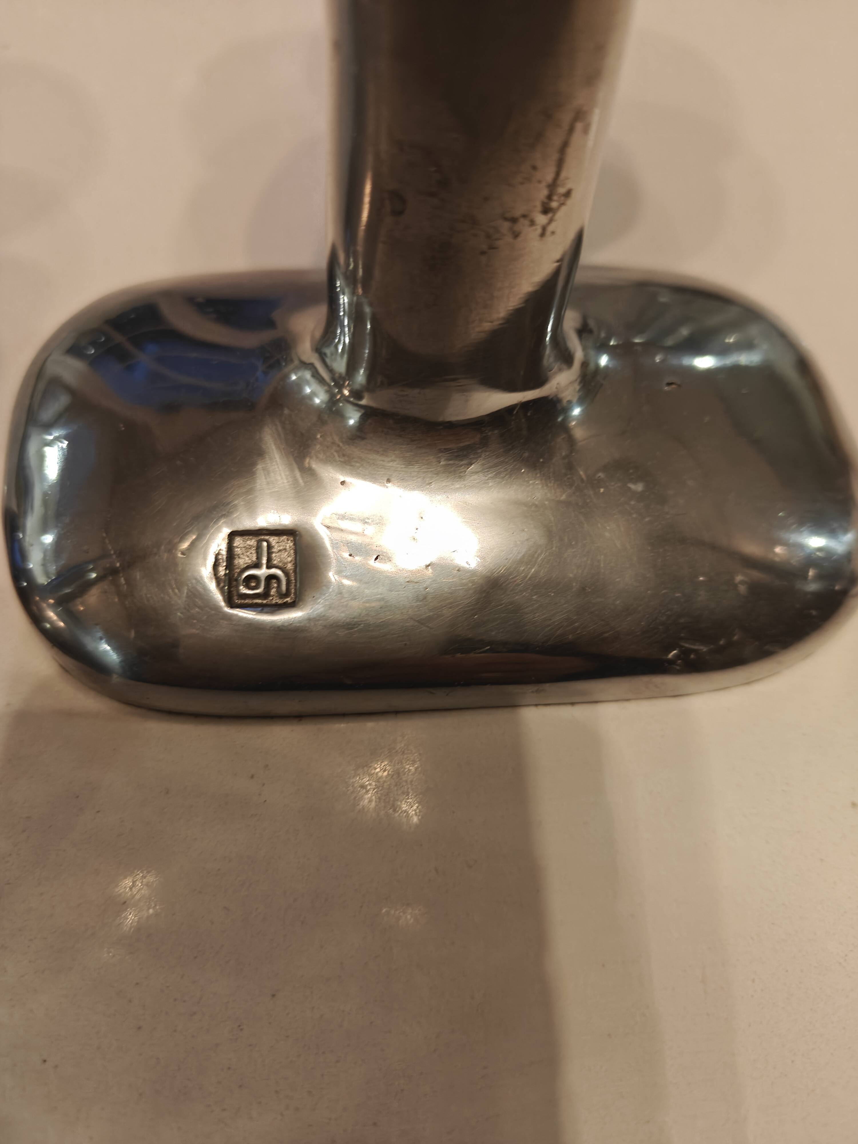 Pair of large candlesticks by David Marshall