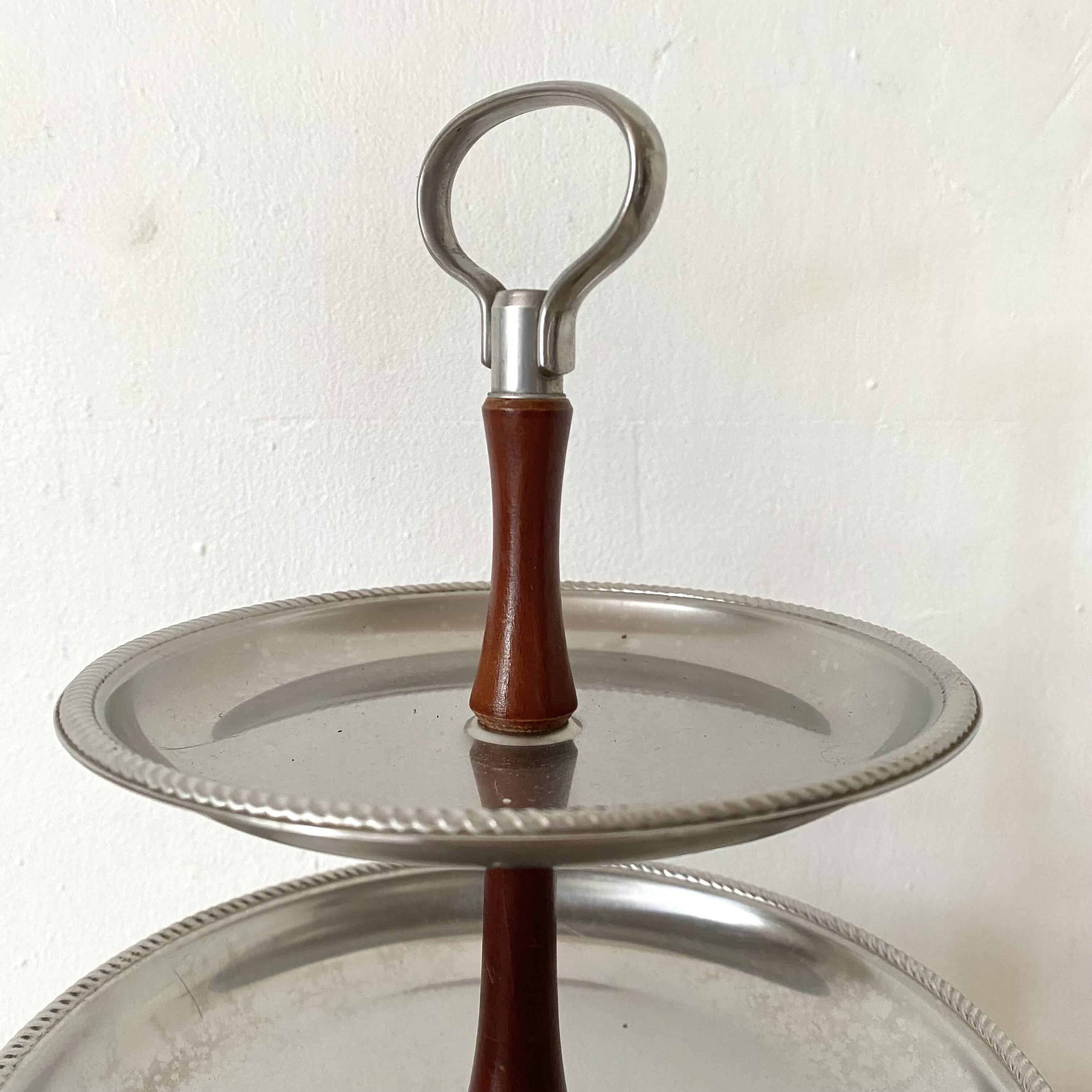 Vintage tiered display stand, stainless steel rotating server Alessi Fratelli
