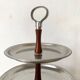 Vintage tiered display stand, stainless steel rotating server Alessi Fratelli