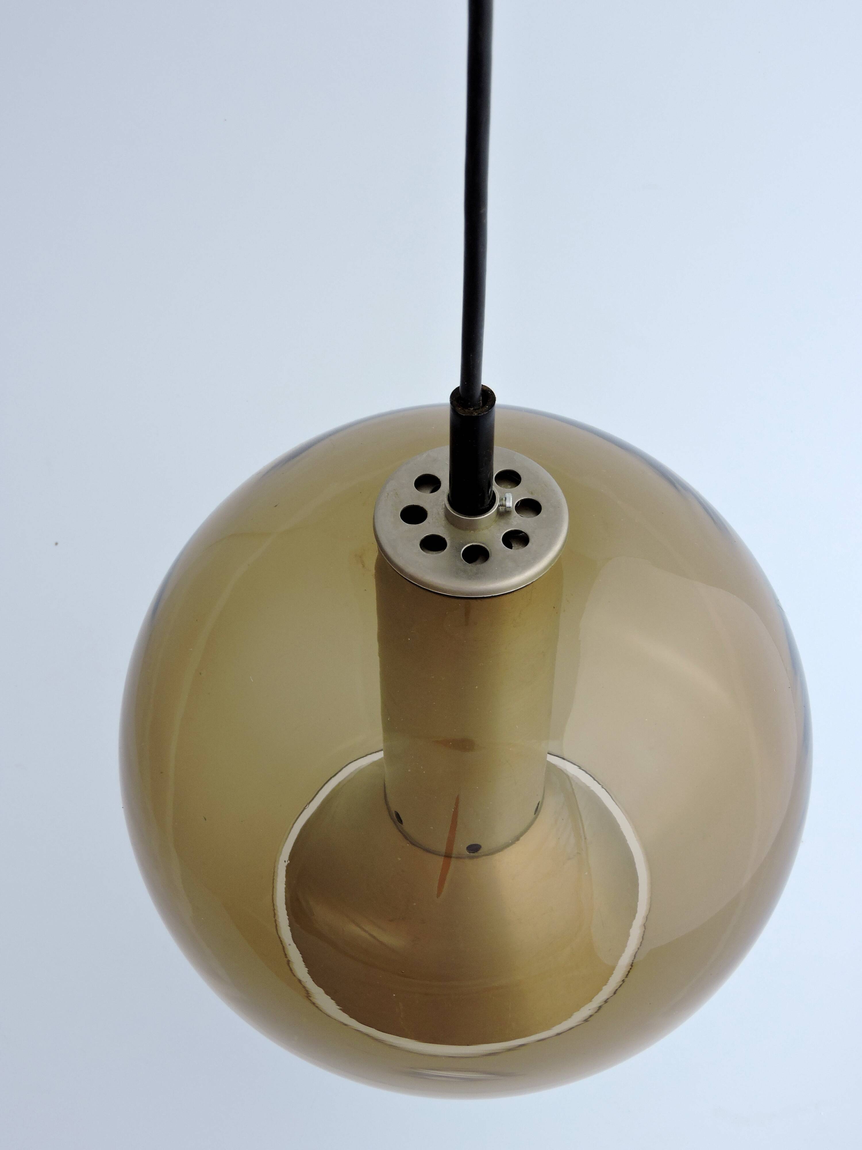 Lampe globe suspension  de frank ligtelijn pour raak