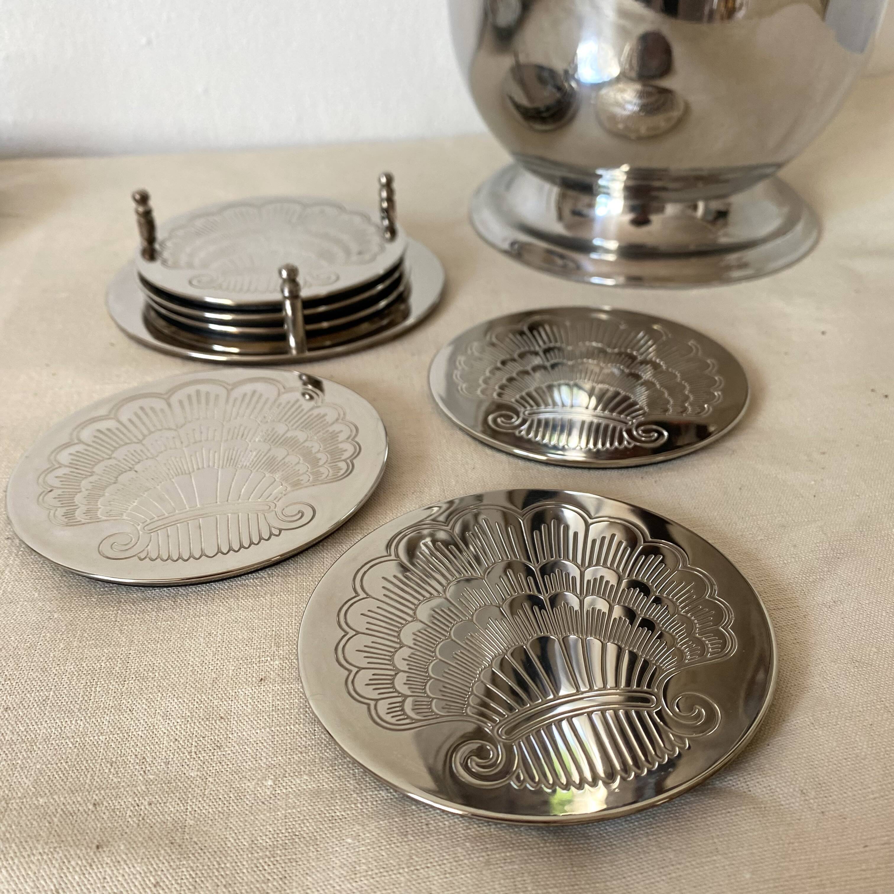 Silver coaster and holder, shell, 80s