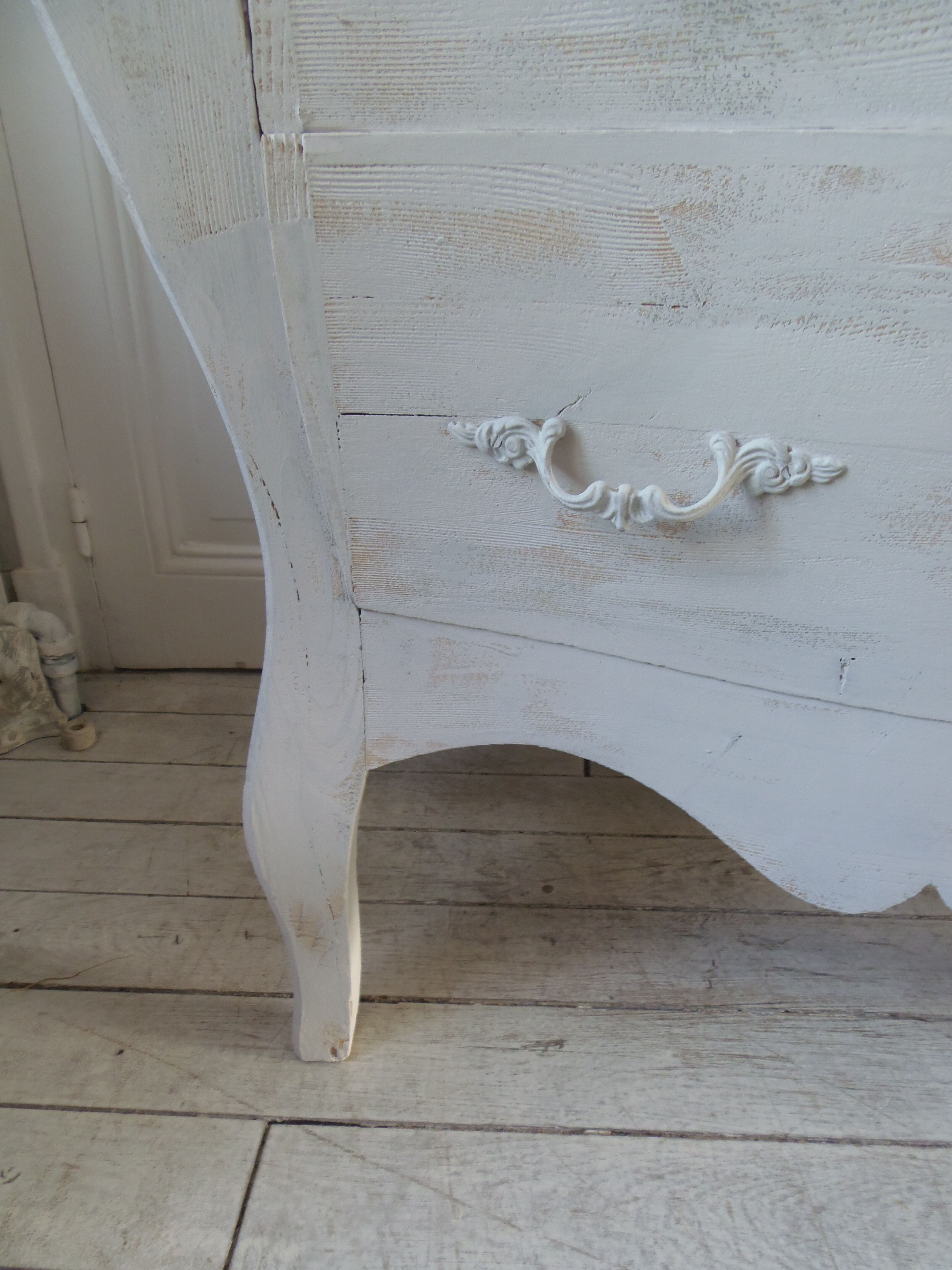 Curved patinated chest of drawers pearl grey waxed finish