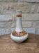 Antique long-necked vase in cracked white ceramic with deer decoration