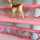 Pink rattan shelf