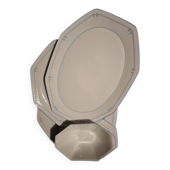 Dishes and porcelain sauceboat