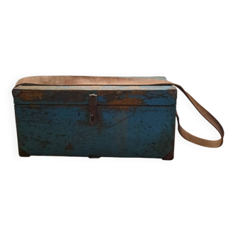 Old wooden trunk with blue patina